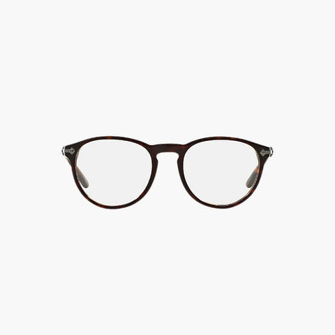 Coco Lee, coins are Kumis brown leather bag